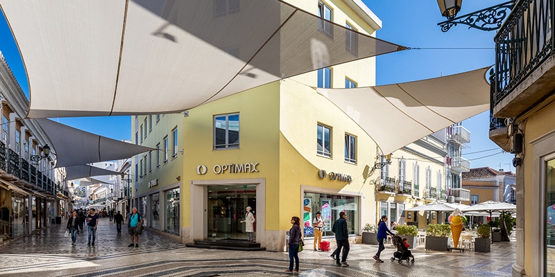 View of the outside of Optimax's store in downtown Faro