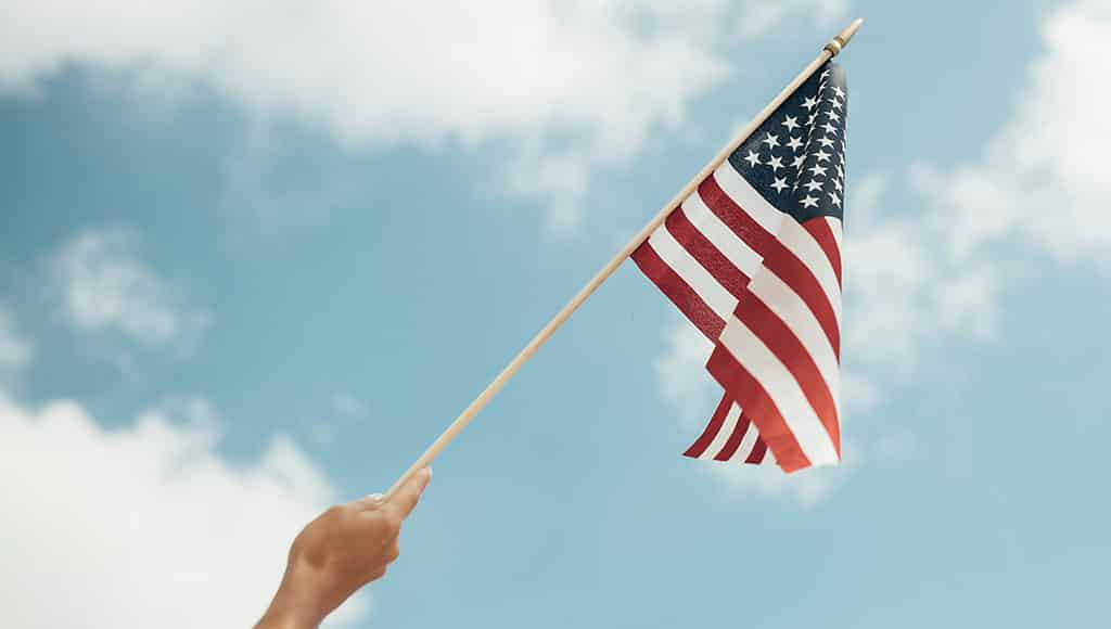 American flag|Oran and Mark hiking in Praia da Luz|Scott and Kal – the nicest neighbors you could ever have.|Monte and Stacey wine tasting in Lisbon|Steve and Marlene – Citizens of the World