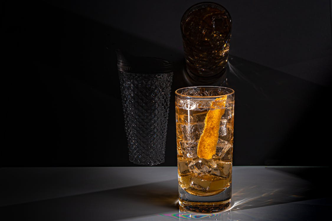 glass with drink and ice