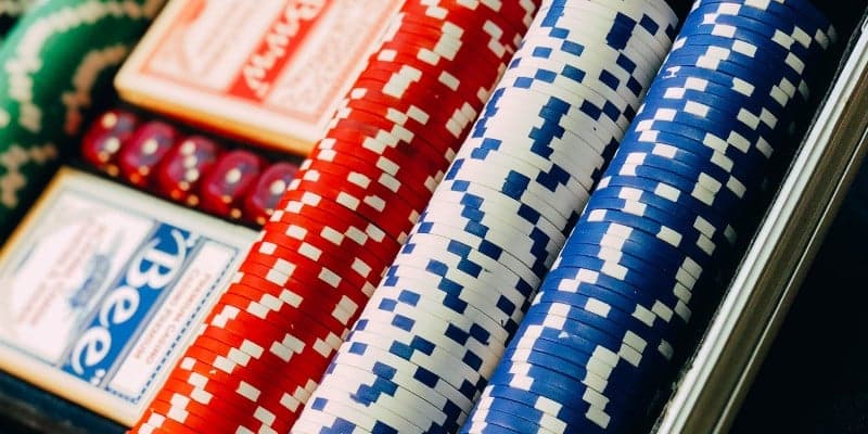 poker dice, cards and chips|poker table