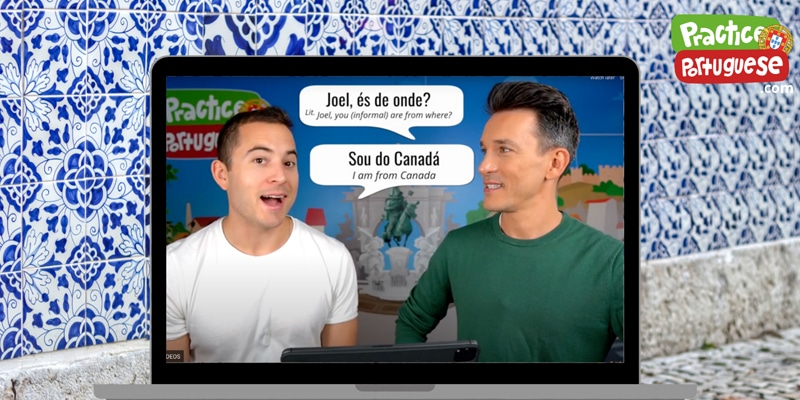 The two founders or PracticePortuguese.com on a laptop screen speaking Portuguese with English subtitles||