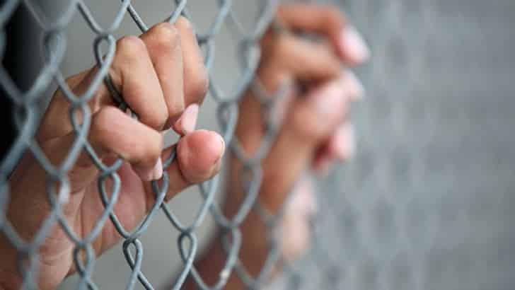 prison-behind-bars-fence_0_0.jpg