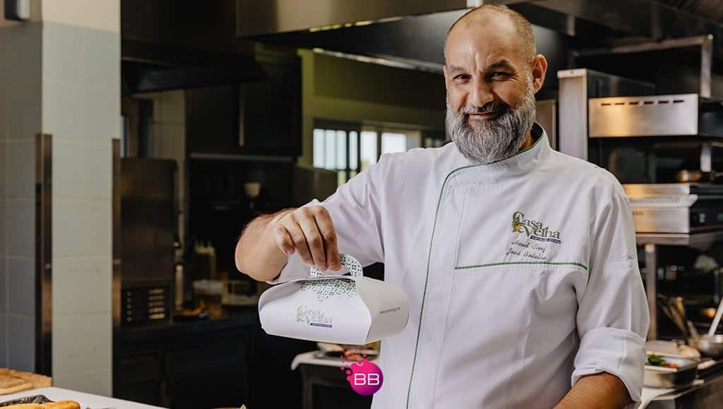 Chef José Botelho at Casa Velha restaurante holding a meal to take home|A taste of Portugal for the whole family|A taste of Portugal for the whole family