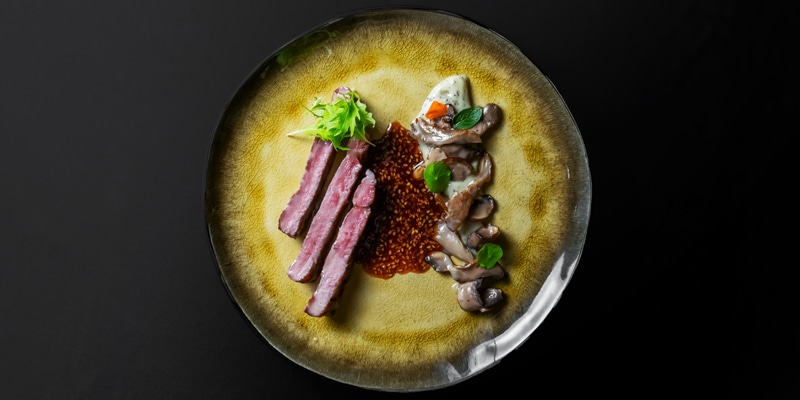 Photo of a dish served at UMAMI|Outside view of UMAMI