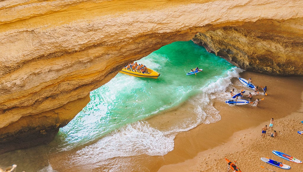 Benagil,Cave,In,Portugal,,Carvoeiro,Algarve,,Lagos.,Tourists,Swimming,On