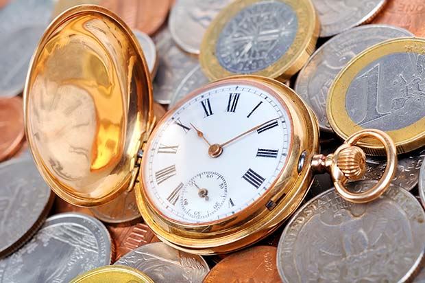 shutterstock_213567748_watch-and-coins.jpg