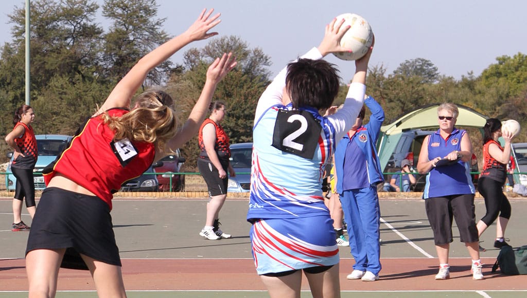 RUSTENBURG, SOUTH AFRICA - June 6: Korfball League games played at Olympia Park on June 6, 2015 in Rustenburg South Africa. Ladies team: Girl catching ball.