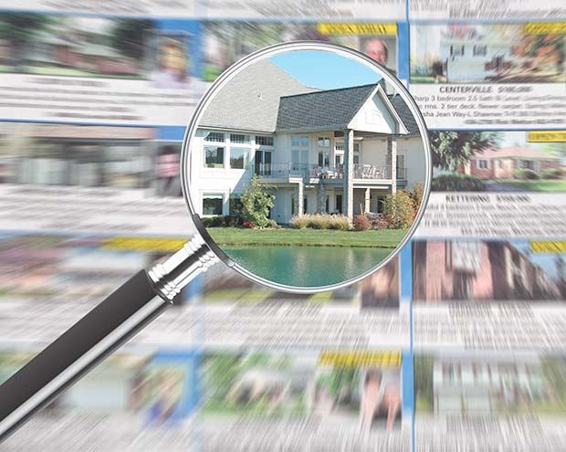 shutterstock_41058496_magnifying-glass-over-real-estate-section-in-newspaper.jpg