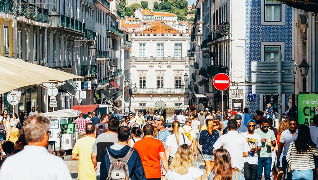 LISBON, PORTUGAL - AUGUST 09, 2017: Everyday Life In Busy Downtown Lisbon City Of Portugal.|LISBON, PORTUGAL - JUNE 13, 2017: The Rua Augusta Arch, a triumphal arch-like, historical building in Lisbon, Portugal, on the Praca do Comercio.