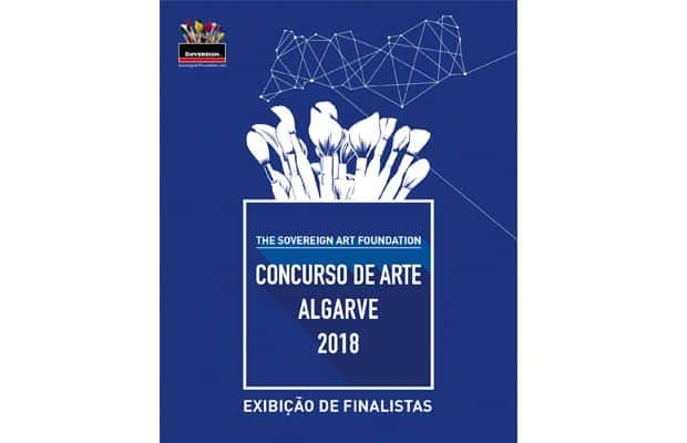 Aerial view to the illuminated Tower Bridge and skyline of London, UK, just after sunset