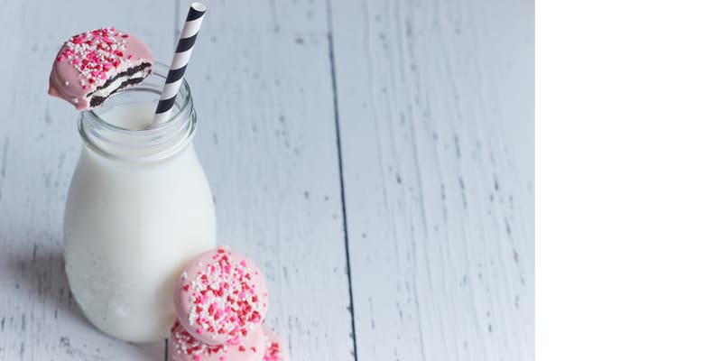 paper straw on a yogurt bottle