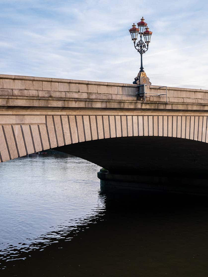 Putney Bridge (Photo: TOM ROGERS/UNSPLASH)|Joseph Bazalgette in the 1870s (Source: NATIONAL PORTRAIT GALLERY LONDON)