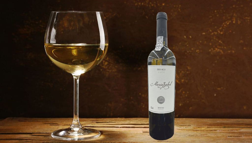 Goblet of white wine on wooden table on wooden wall background. Fotalia