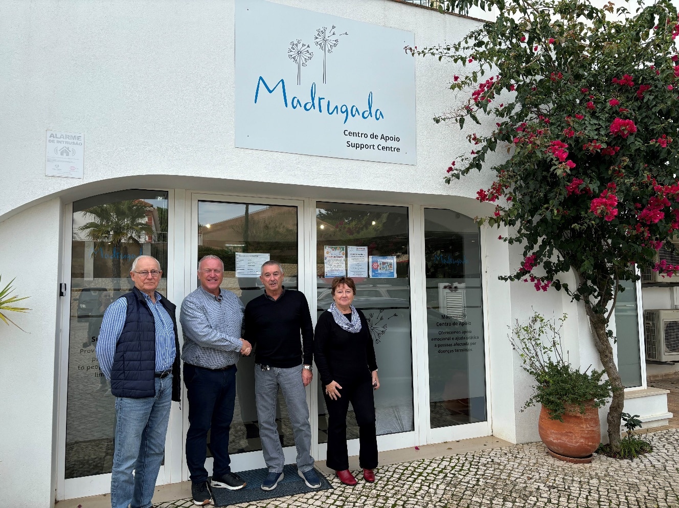 Algarve 41 Club Vice Chairman, Paul Collins, presenting Madrugada Chairman, John Hough, with a donation