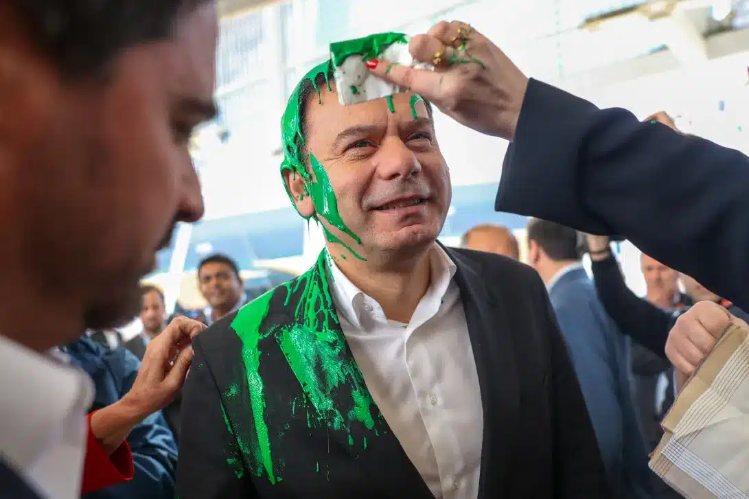 Climate activist fined €1,600 for throwing green paint over future PM
