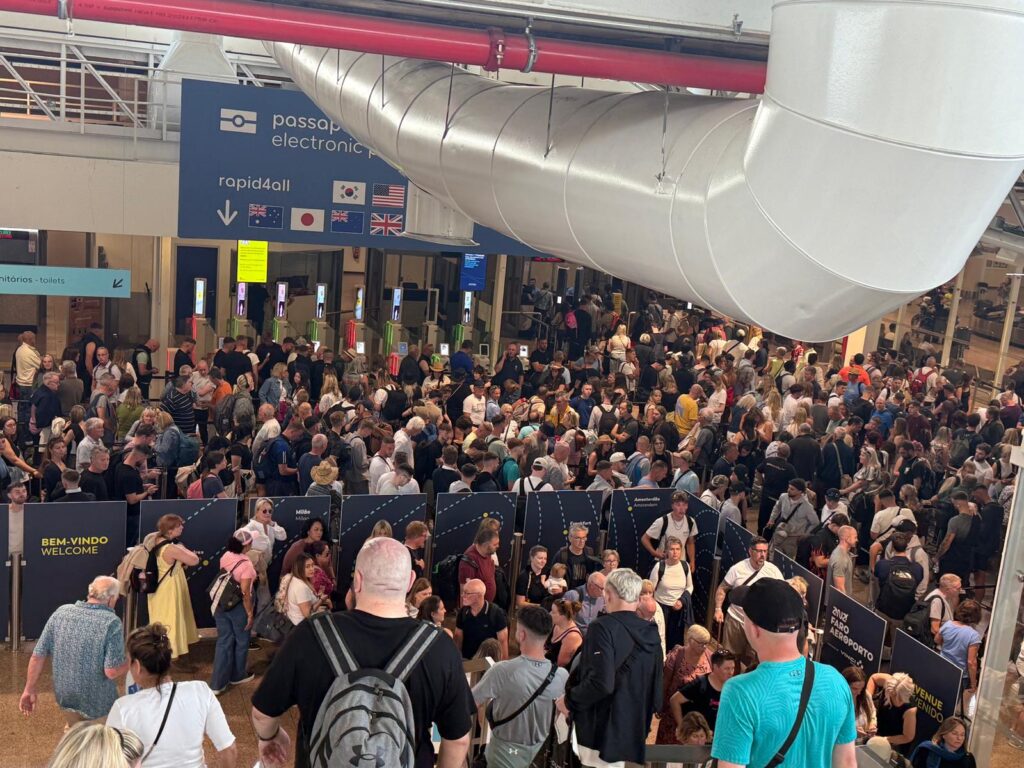 Minister says airport queues "should be resolved within two weeks"