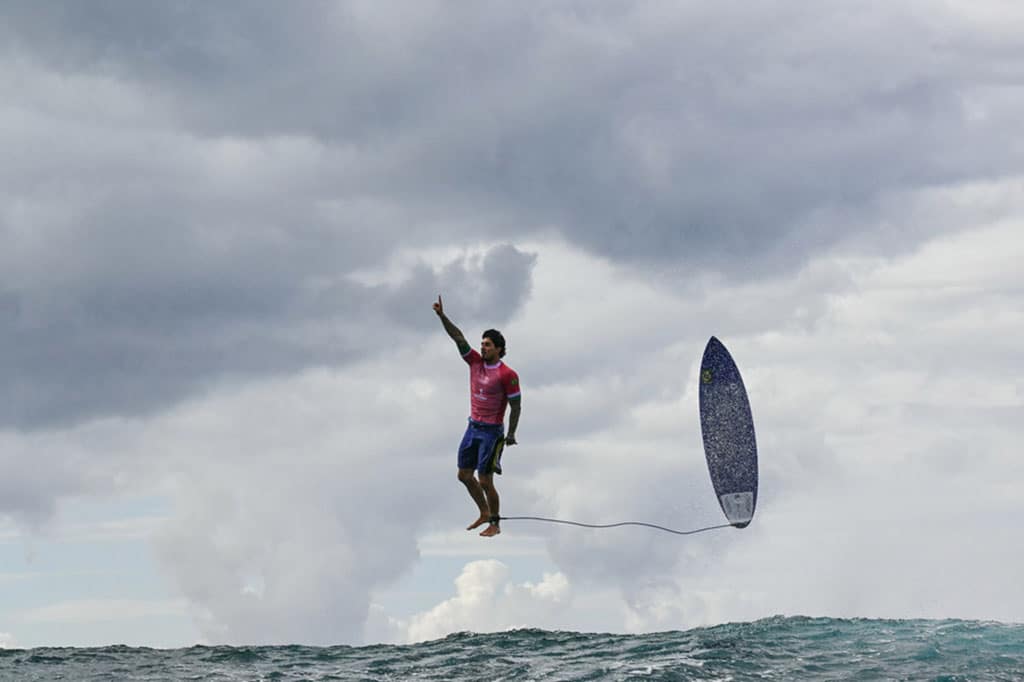 Brazil's Gabriel Medina reacts after catching a large wave in the 5th heat of the men's surfing round 3, during the Paris 2024 Olympic Games, in Teahupo'o, on the French Polynesian Island of Tahiti, on July 29, 2024.† (Photo by Jerome BROUILLET / AFP)