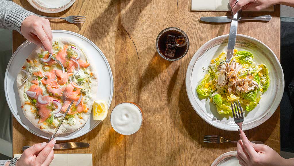 Photo of the plates two people are eating at KOKO in Quinta do Lago