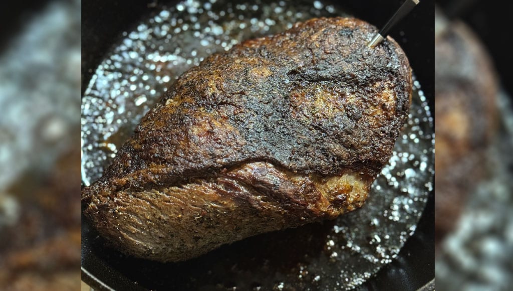Picanha with rendered fat and the temperature probe