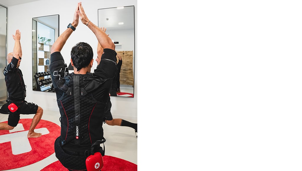 Three men training EMS at Pulse Fit in Lagos