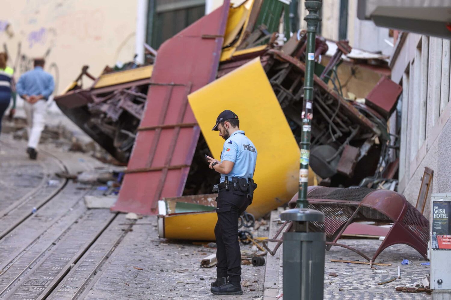 Technical experts assess the accident involving the Gloria funicular in Lisbon, a popular transportation used by tourists, which derailed yesterday in Lisbon, Portugal, 04 September 2025. At least 17 people died in the derailment and 22 others were injured, local emergency services reported. Photo: EPA/TIAGO PETINGA