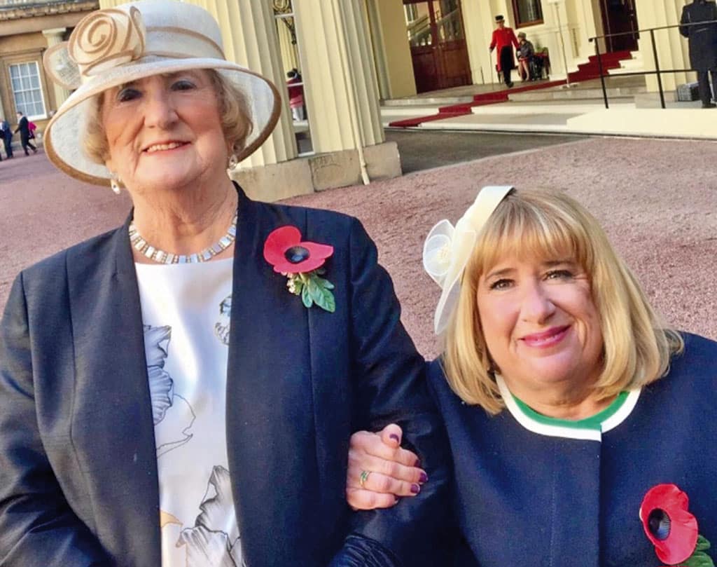 Mum and Carole about to enter Buckingham Palace
