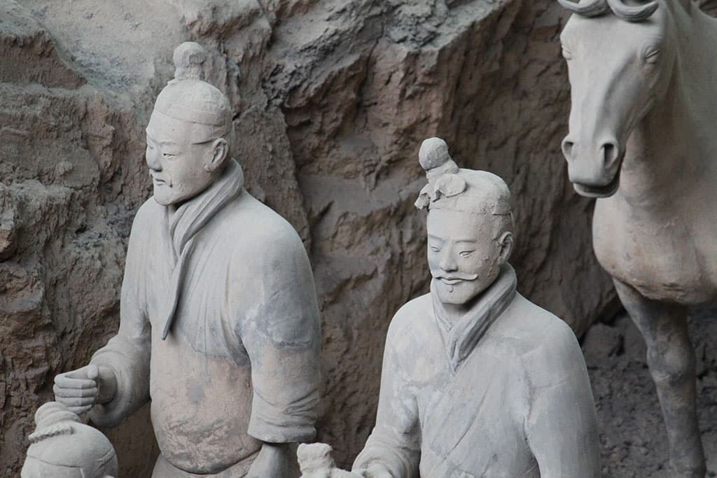 Terracotta soldiers wearing cloth bands around their necks