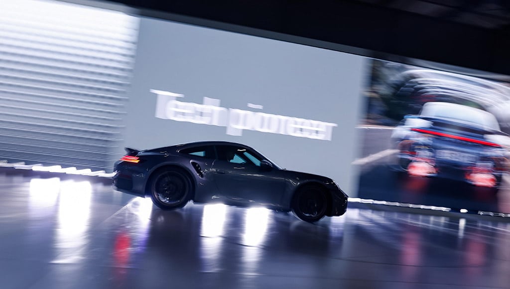 A Porsche automobile on a exhibition