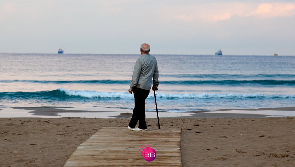 An old man looking at the sea
