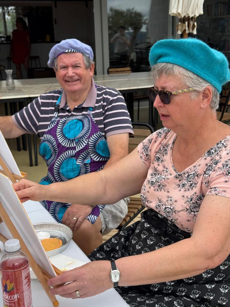 Beret busy: a dash of French flair for one painting couple