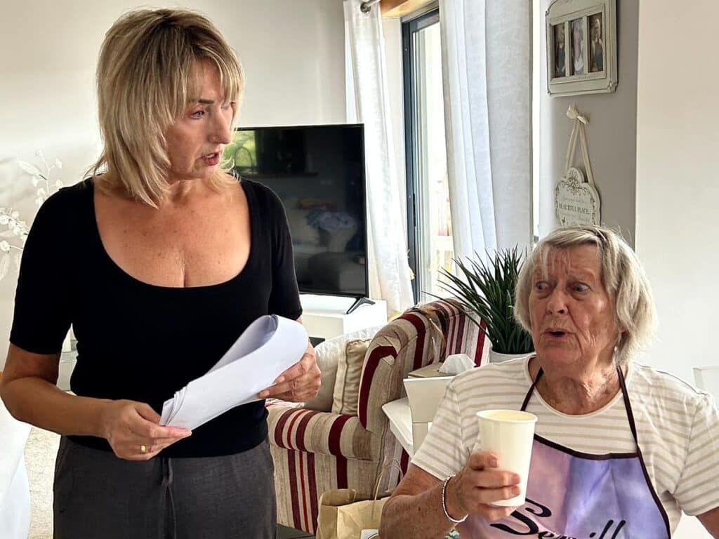 Sarah and Gloria rehearsing an episode of Dinner Ladies
