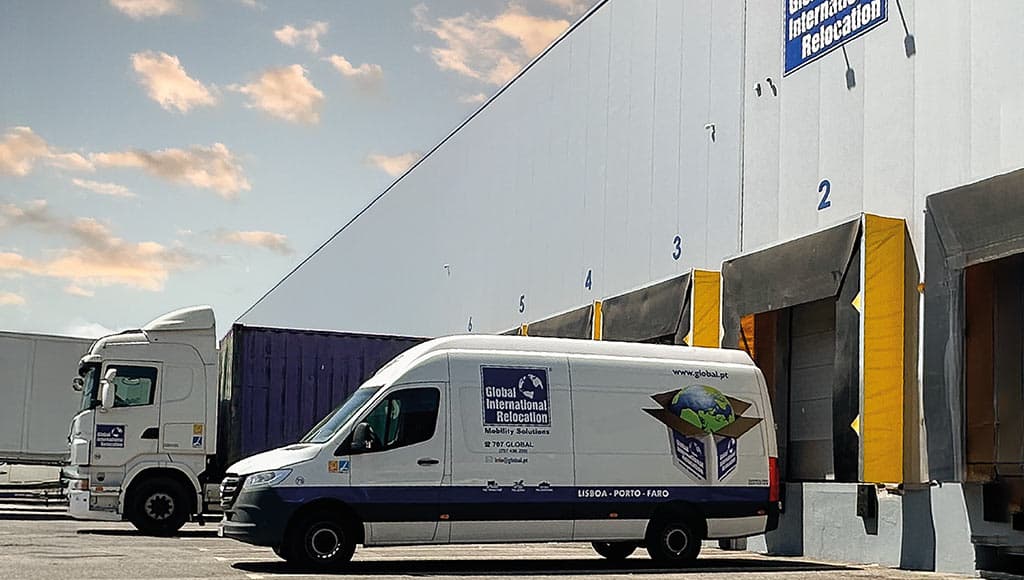 A van of Global International relocation at their logistics and mobility terminal
