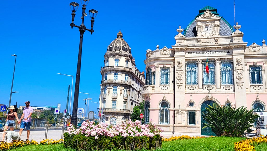 Porto in full sun - Aliados shimmers under a clear sky, where old façades curve gently toward the day.