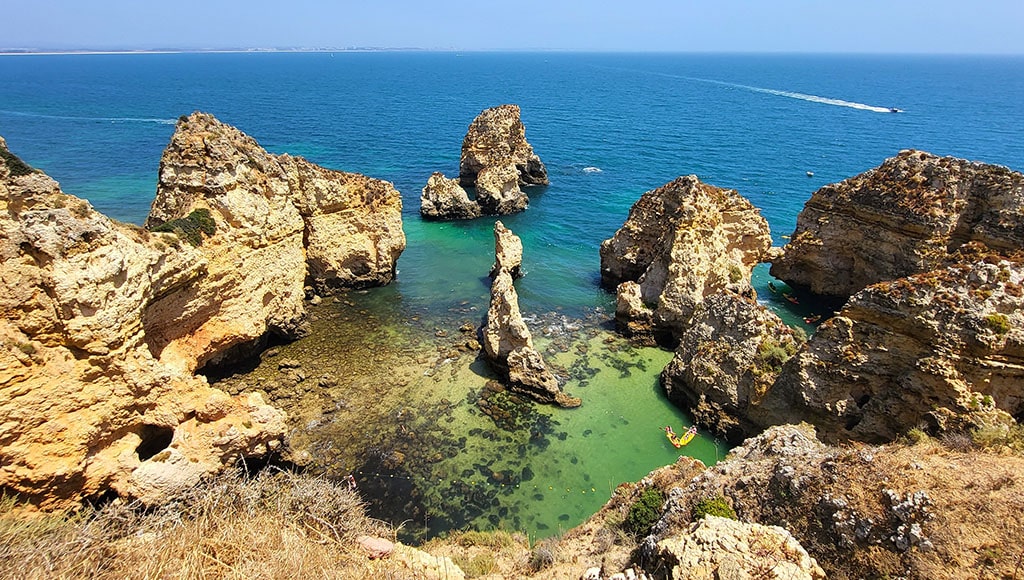 Algarve cliffs revealed - Ponta da Piedade opens into turquoise water and limestone towers shaped by wind and time.