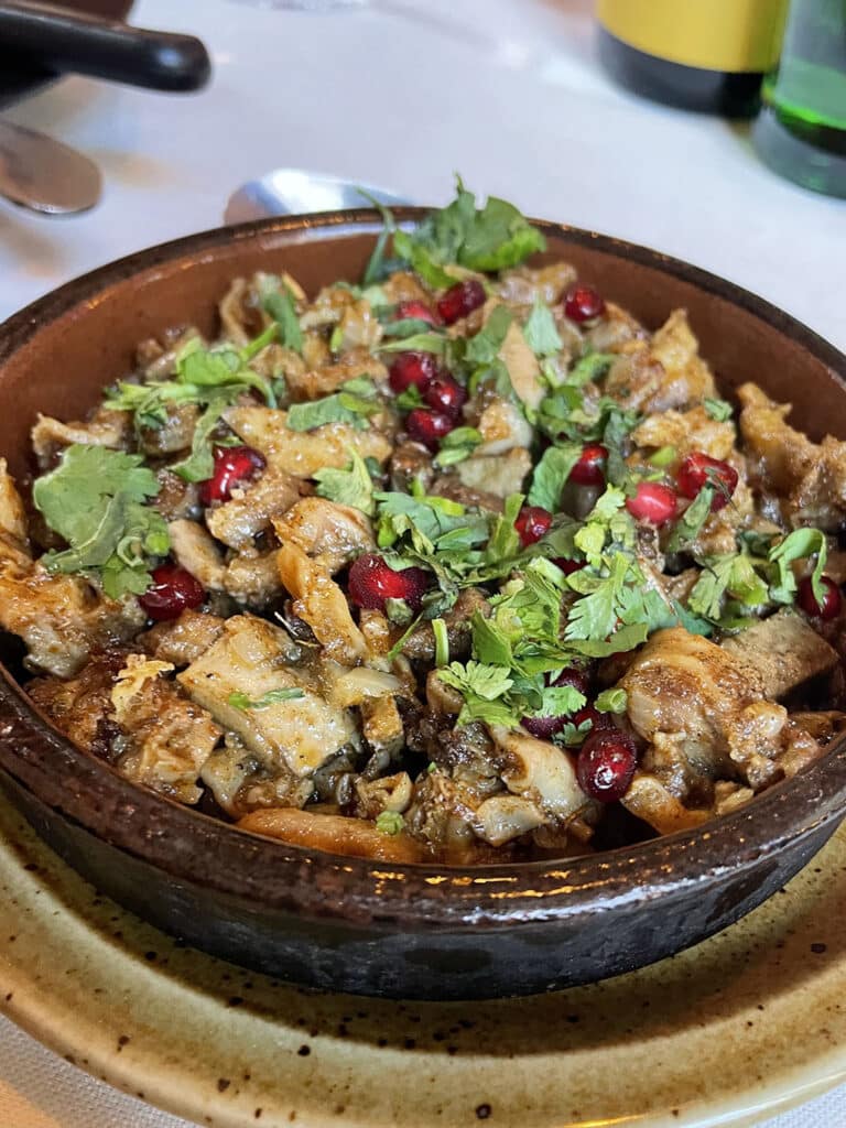 Georgian kuchmachi dish dressed with the pomegranate