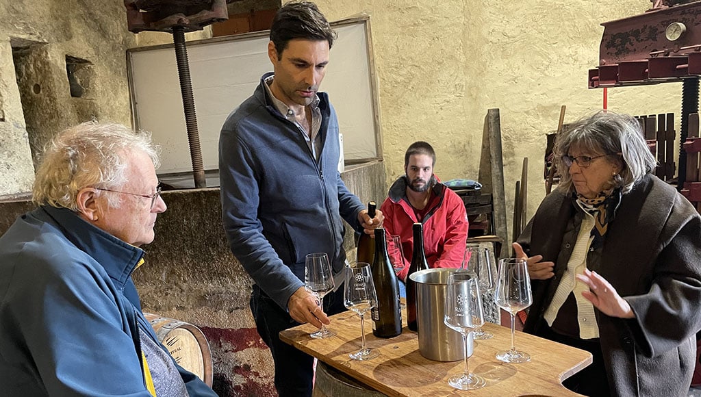 Nuno Ramilo pouring, in his makeshift tasting area in the barrel room