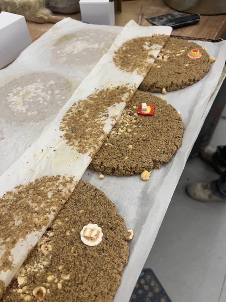 Trinkets hidden in frangipane that is commonly frozen before use