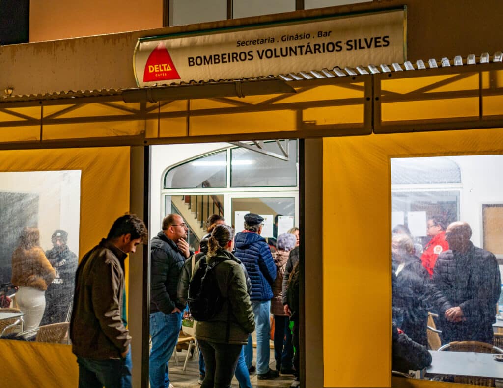 Voters gather at the Bombeiros Café in Silves before the election
