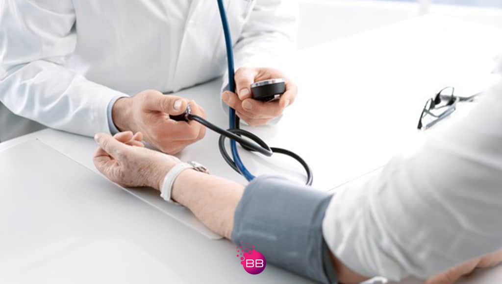 A doctor taking a patients blood pressure at Luzdoc new cardiology specialty consult