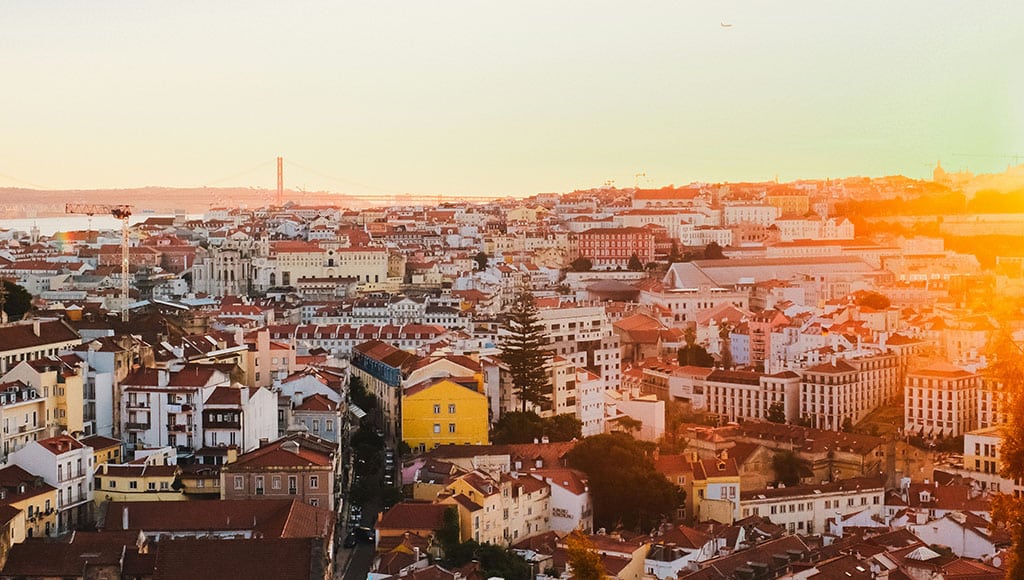 Golden hour over Lisbon’s red rooftops
